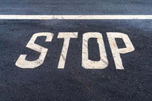 Stop Printed on Ground - Abels and Annes Chicago Stop Sign Accident Lawyer