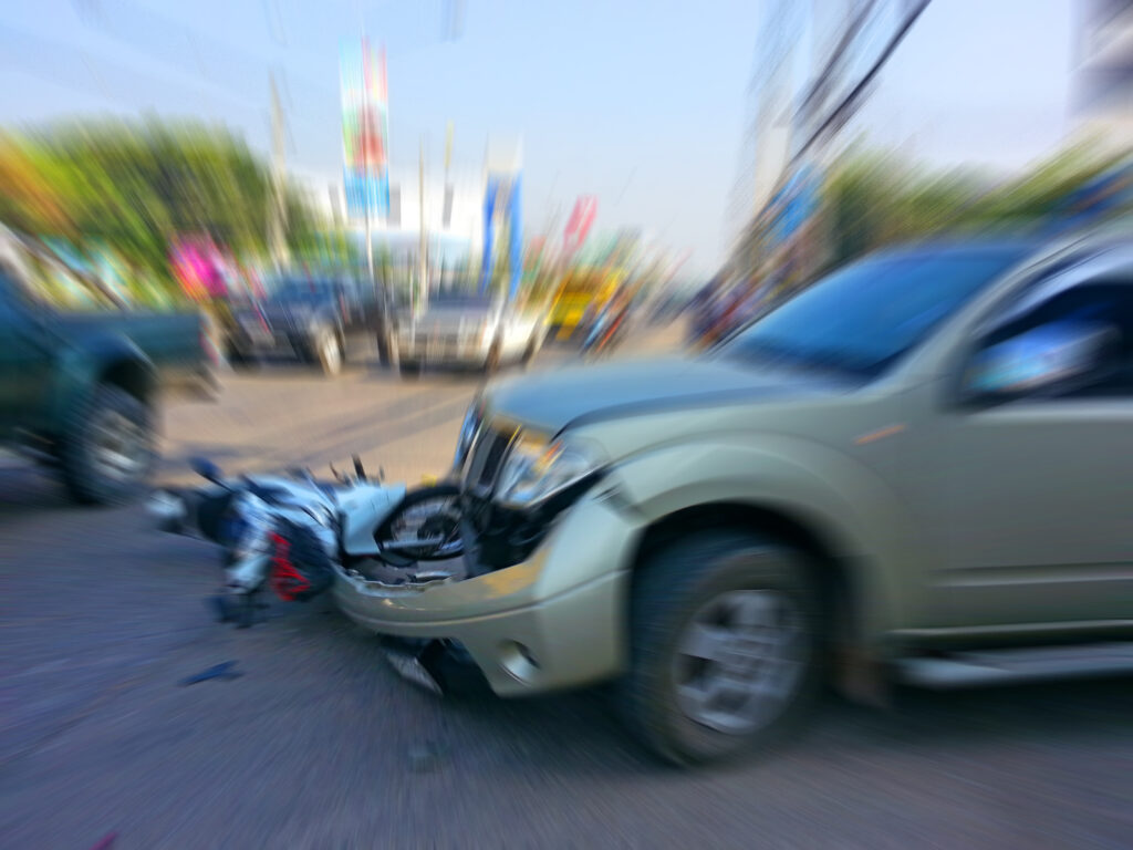 What happens if a road hazard caused my motorcycle accident?