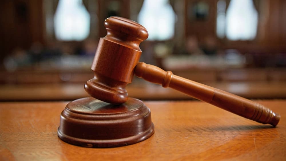 A dramatic courtroom gavel symbolizes justice and legal proceedings—ideal for law and legal-content use.